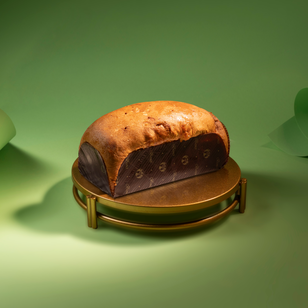 Foto ambientata Bria Tronchetto Mela & Calvados 500g, prodotto su vassoio