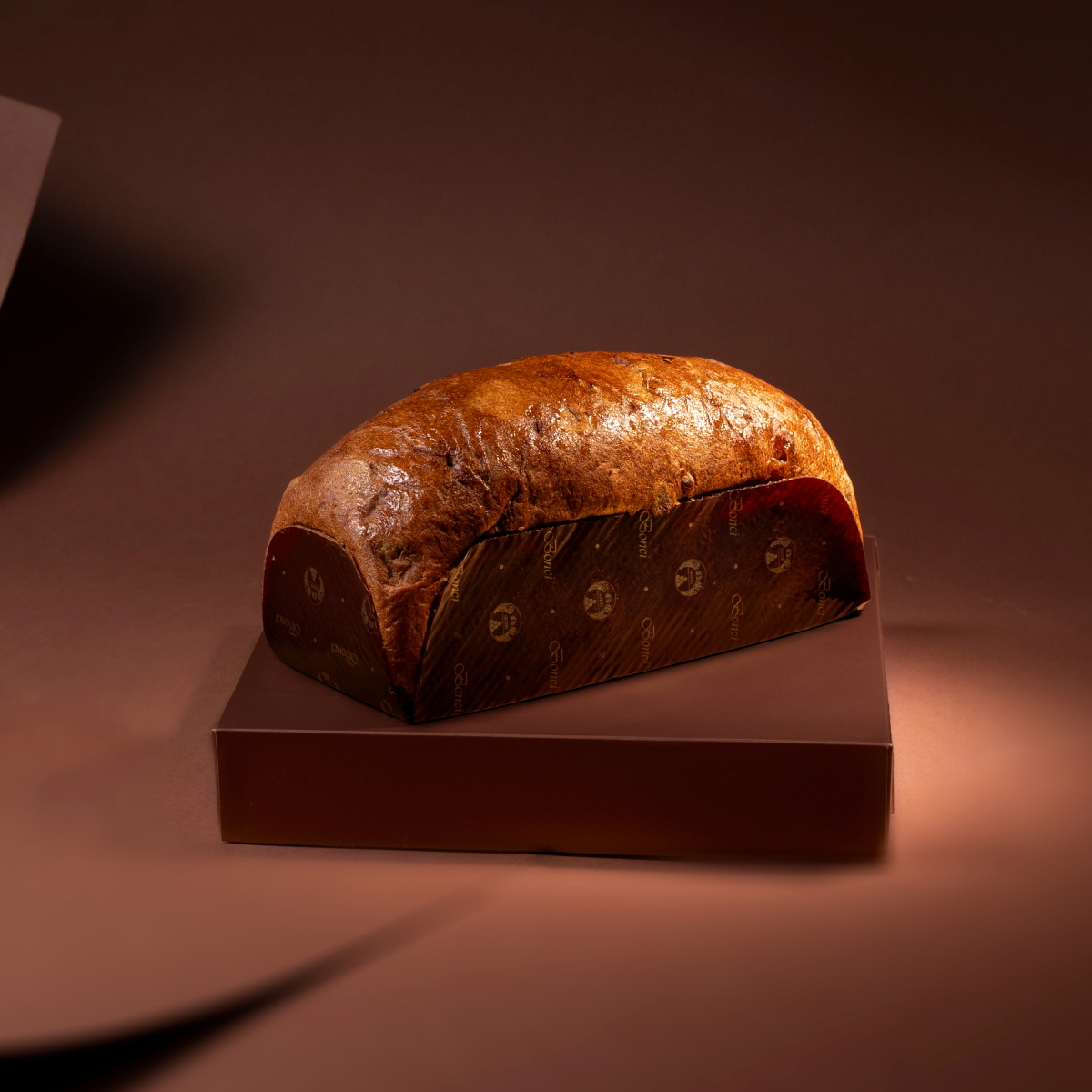 Foto ambientata Bria Tronchetto Mokanero 500g, prodotto su vassoio